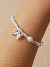 wearing Silver Bowknot Bracelet